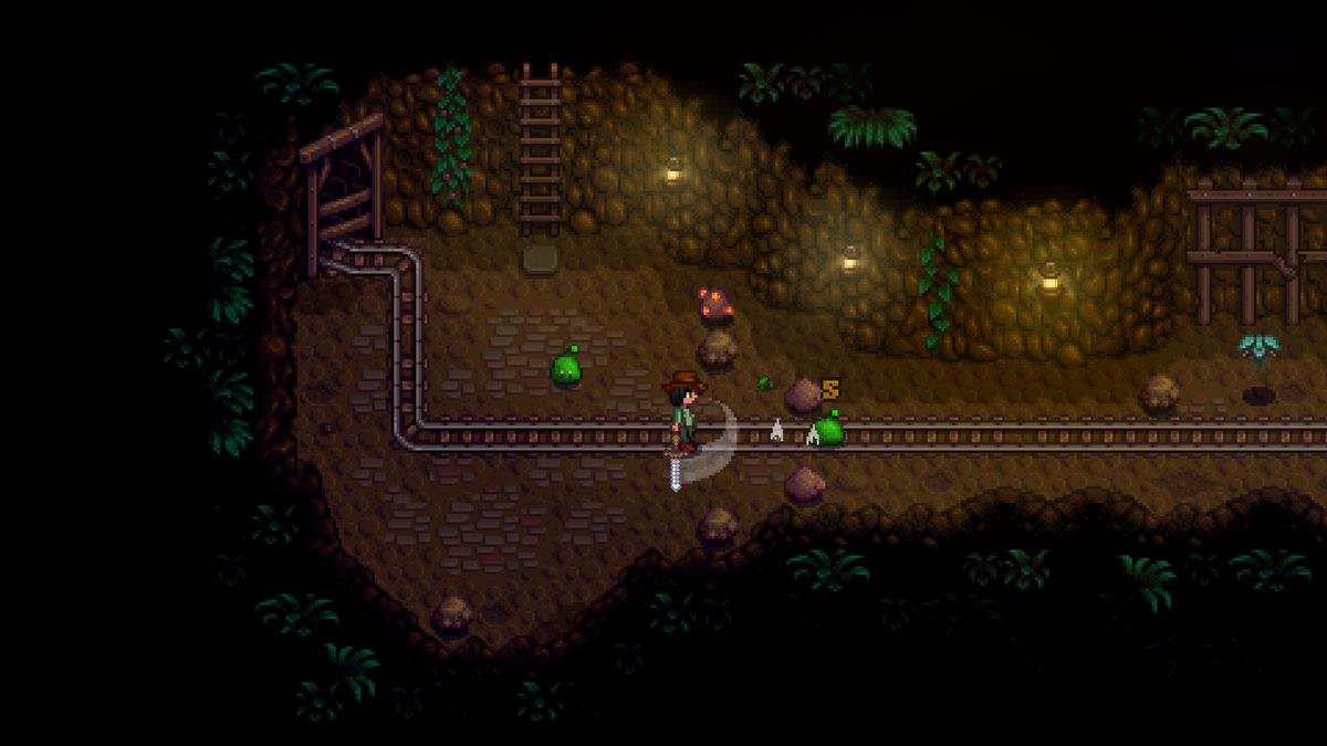 Your character fighting slimes inside the mines by swinging your sword in Stardew Valley.