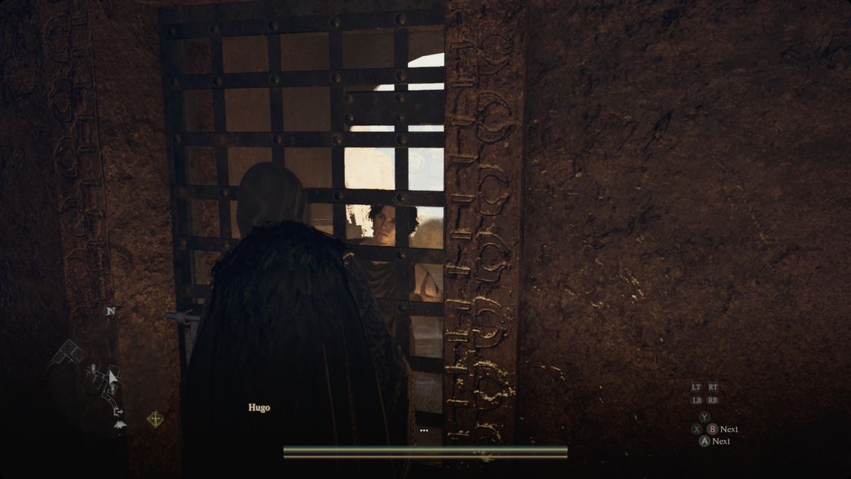 Dragon’s Dogma 2 speaking to Hugo in the Battahl Gaol