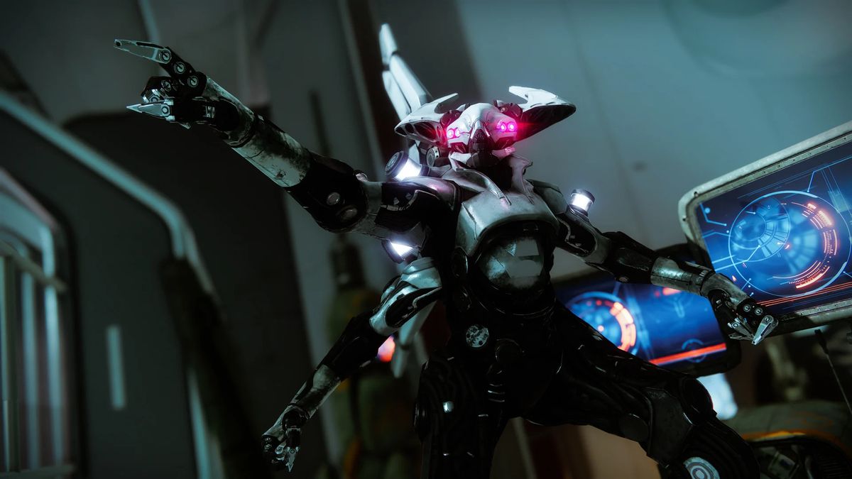 Atraks-1, a raid boss in Destiny 2’s Deep Stone Crypt raid, points toward the camera. Atraks-1 is an Exo Fallen, a white robot with multiple eyes and armor.