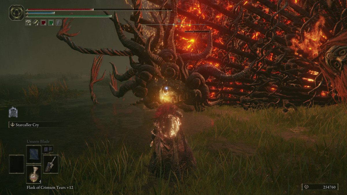 A Tarnished battles against a boss, Furnace Golem, in Elden Ring: Shadow of the Erdtree