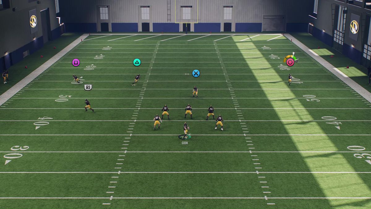 A player on the Mizzou Tigers prepares to catch a pass in with the Placement and Accuracy icon on the screen in College Football 25