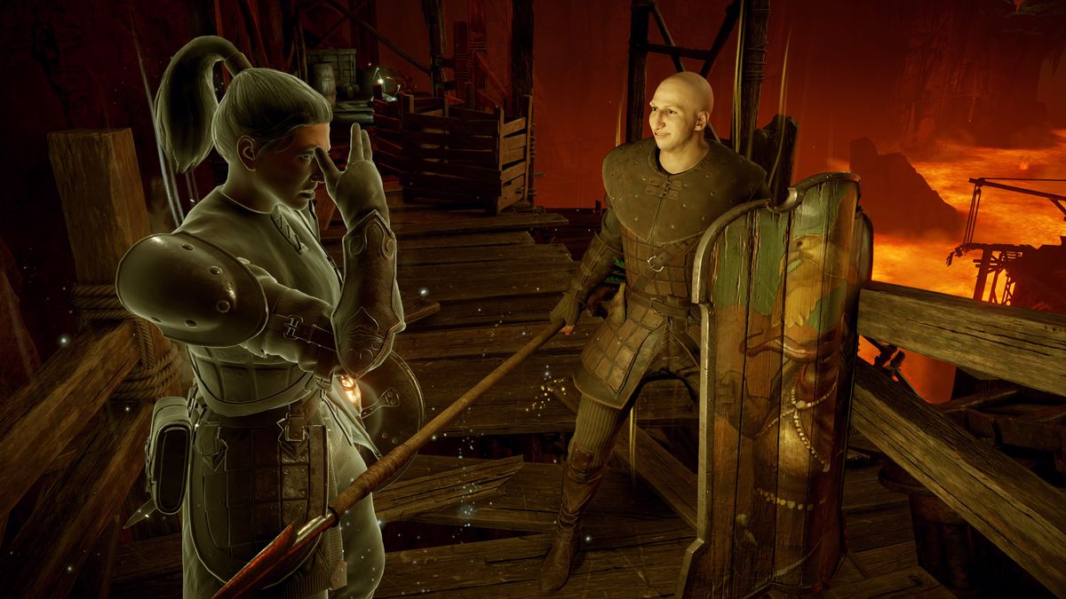 Patches, as he appears in the 2020 Demon’s Souls remake, in Stonefang Tunnel next to a player character