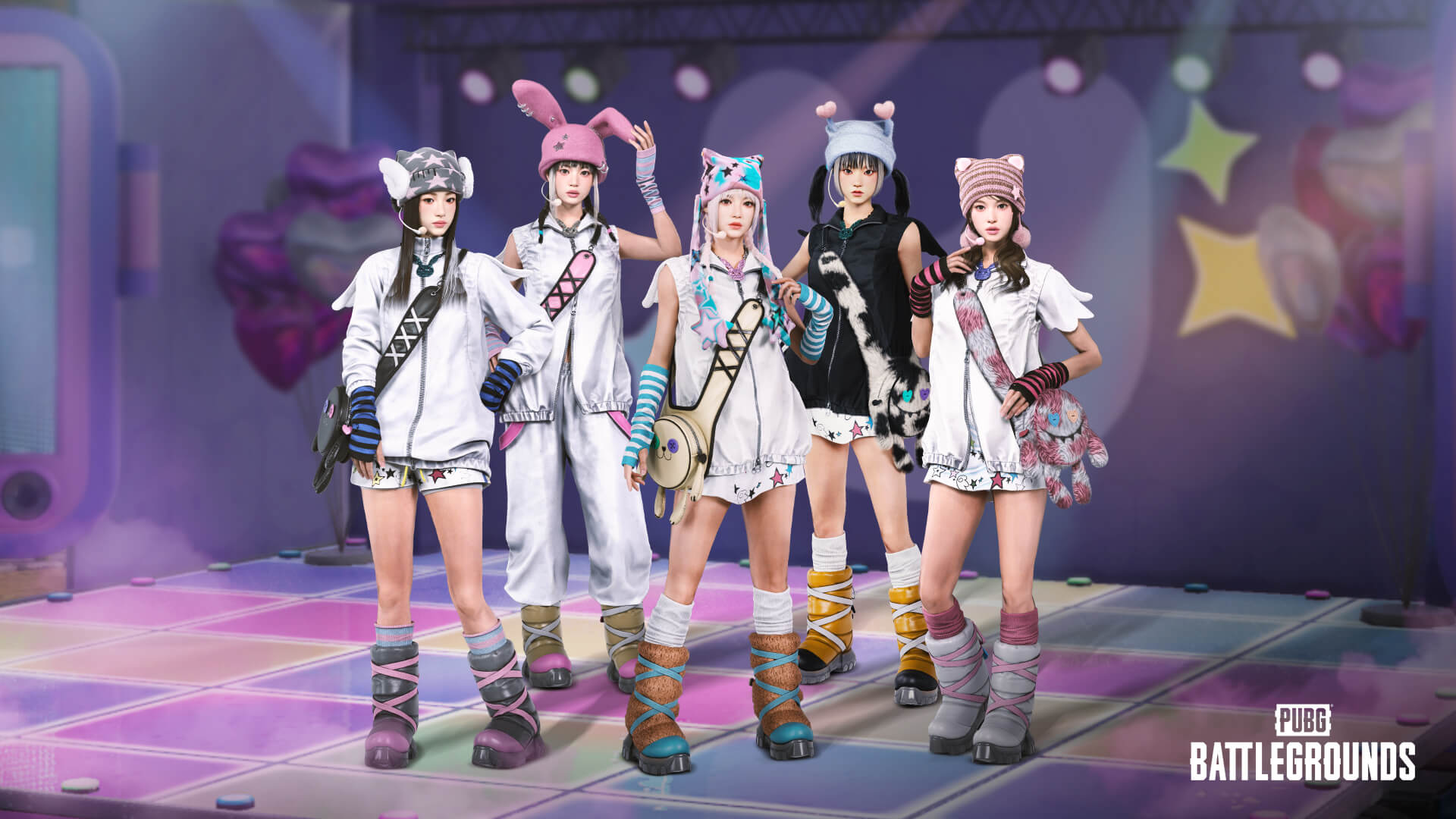 An image of the K-pop group NewJeans in PUBG. They are dressed up in pastel colors and some have cute beanies with animal ears.