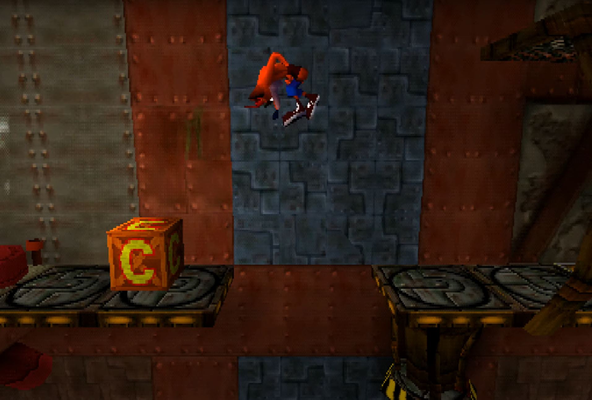 Crash Bandicoot somersaults towards a crate on a platform