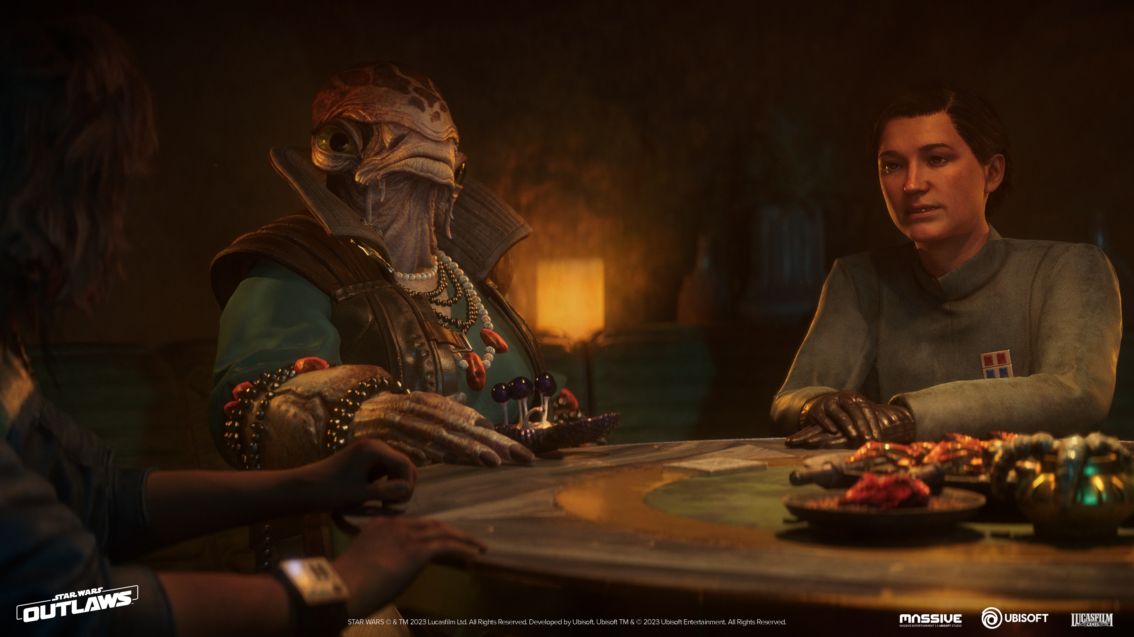 Danka, a Mon Calamari wearing lots of jewelry, sits with Kay (left) and another woman (right)