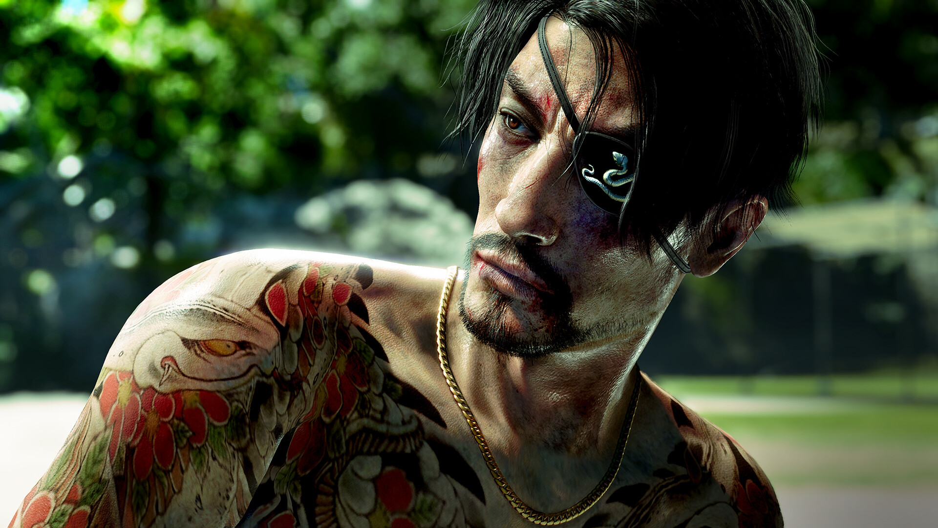 Longtime Yakuza character Goro Majima wearing an eyepatch and looking solemn