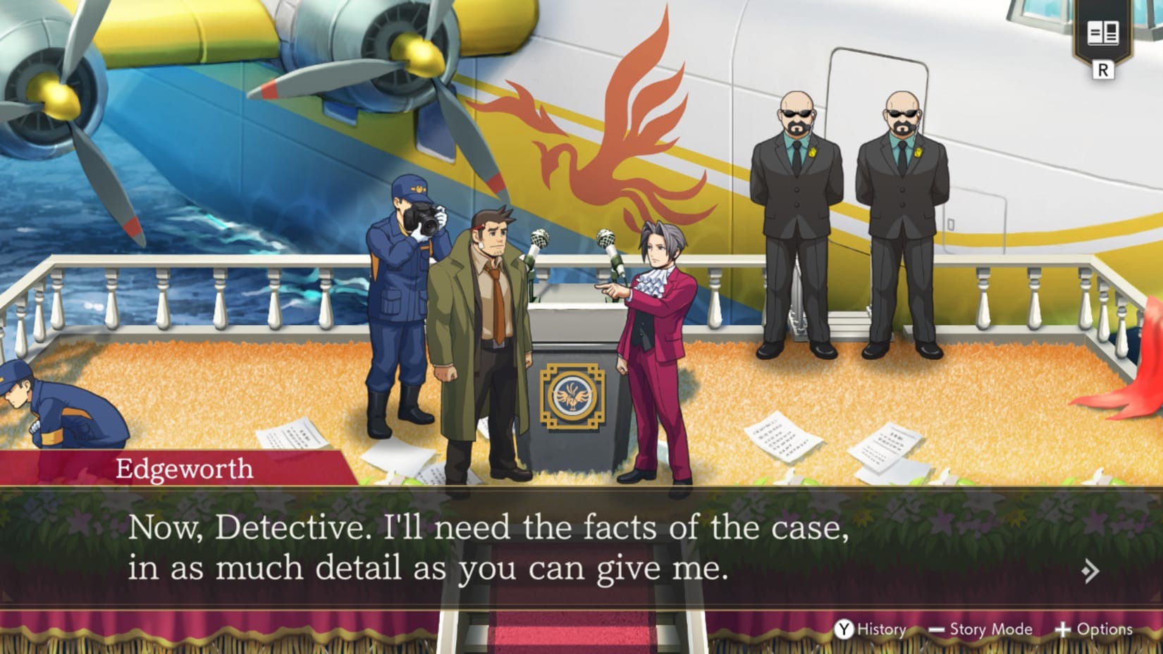 A wide shot of Miles Edgeworth pointing at a man and saying, “Now, Detective. I’ll need the facts of the case, in as much detail as you can give me.” In the background, there’s a crashed plane in some water, two guards in sunglasses, and forensics specialists analyzing the scene and taking photos.A wide shot of Miles Edgeworth pointing at a man and saying, “Now, Detective. I’ll need the facts of the case, in as much detail as you can give me.” In the background, there’s a crashed plane in some water, two guards in sunglasses, and forensics specialists analyzing the scene and taking photos.