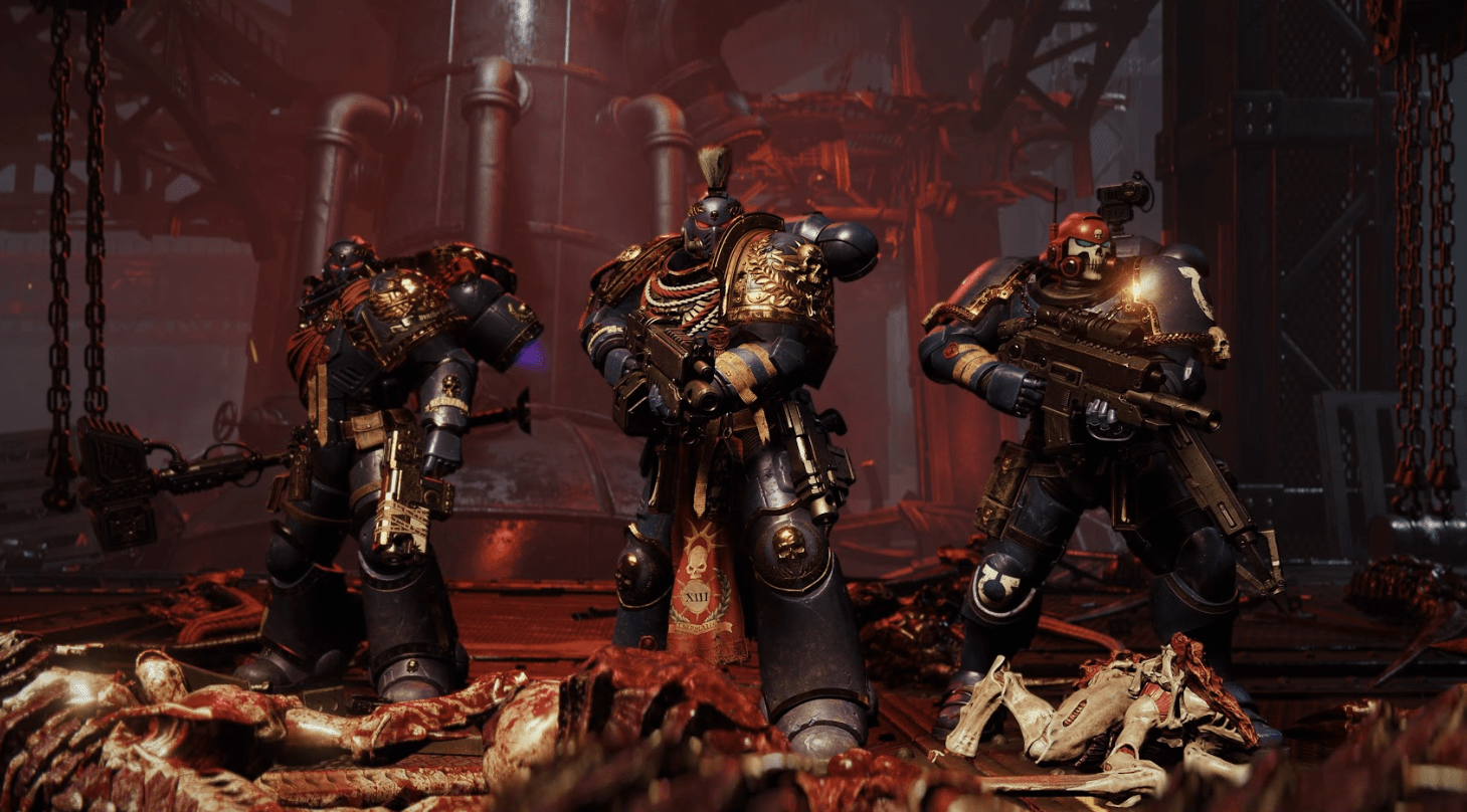 A squad of three Space Marines for the game’s co-op mode, each wearing customized armor with different accoutrements.