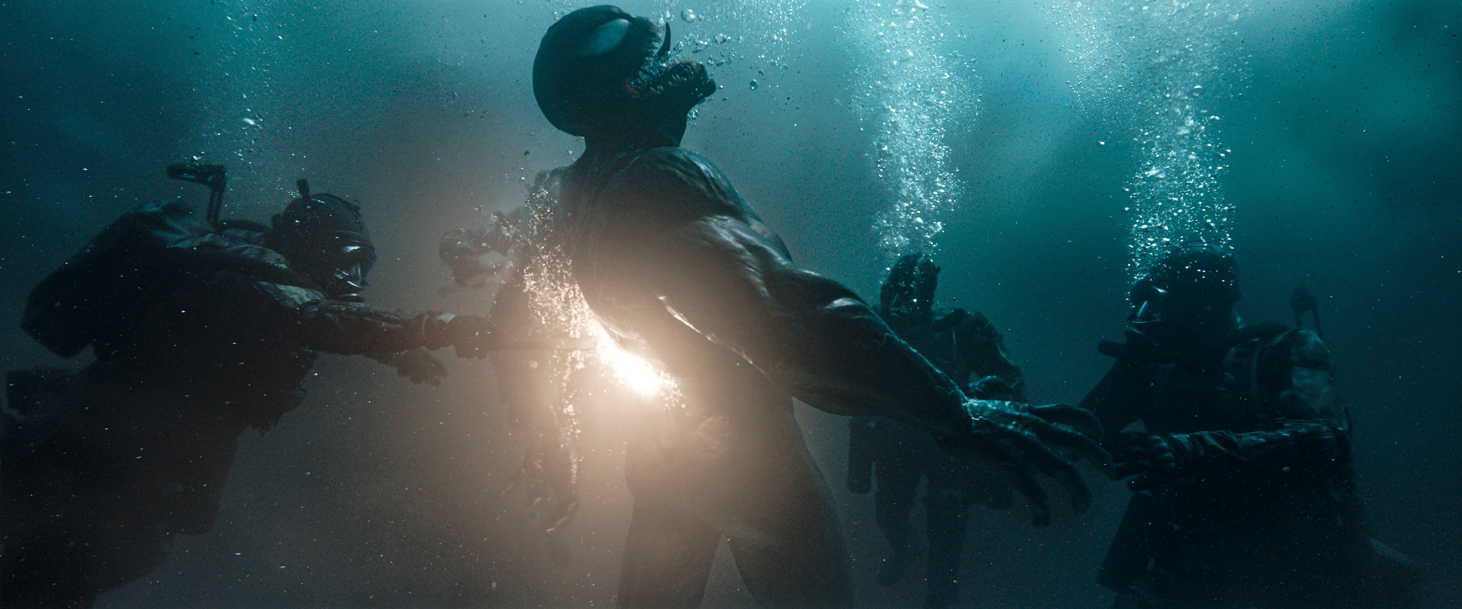 Divers taze Venom in Venom: The Last Dance.