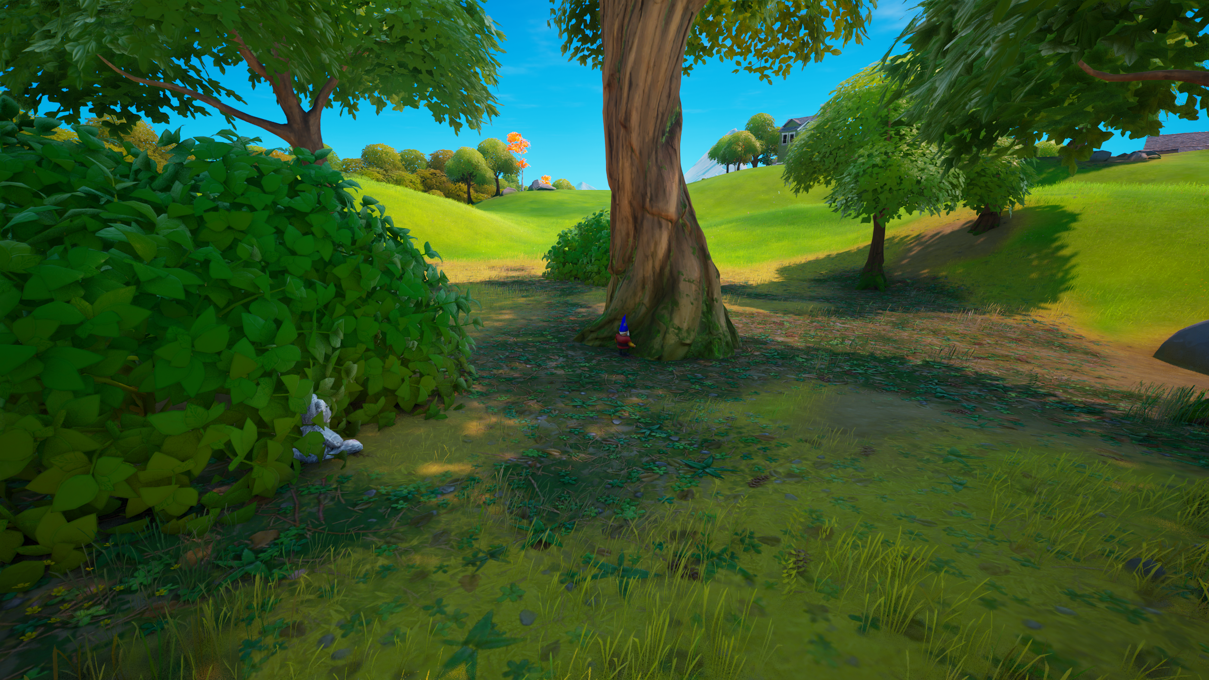 A gnome stands near a tree in Fortnite Remix