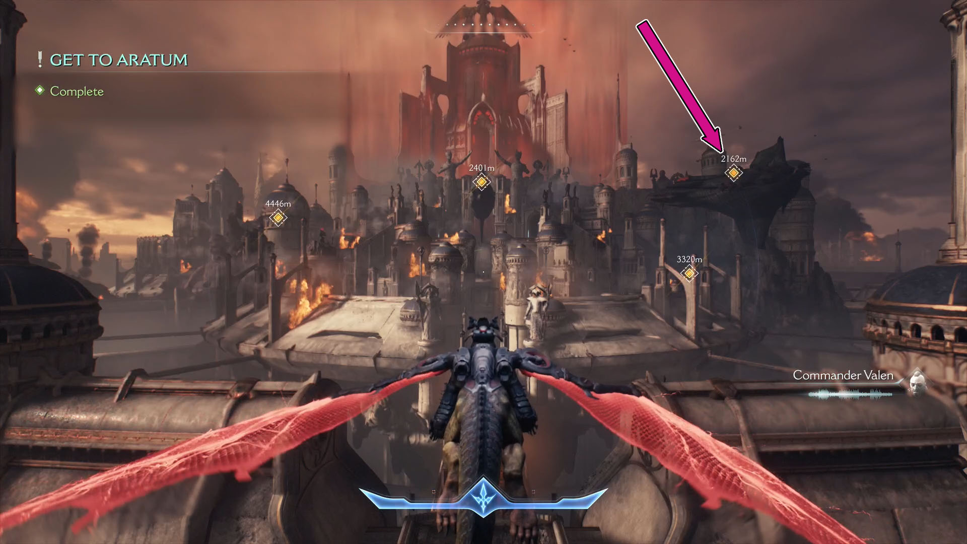 A Doom: Dark Ages screenshot showing the character flying on their cyberdragon and a pink arrow on the right side of the image poiting to a specific ship.