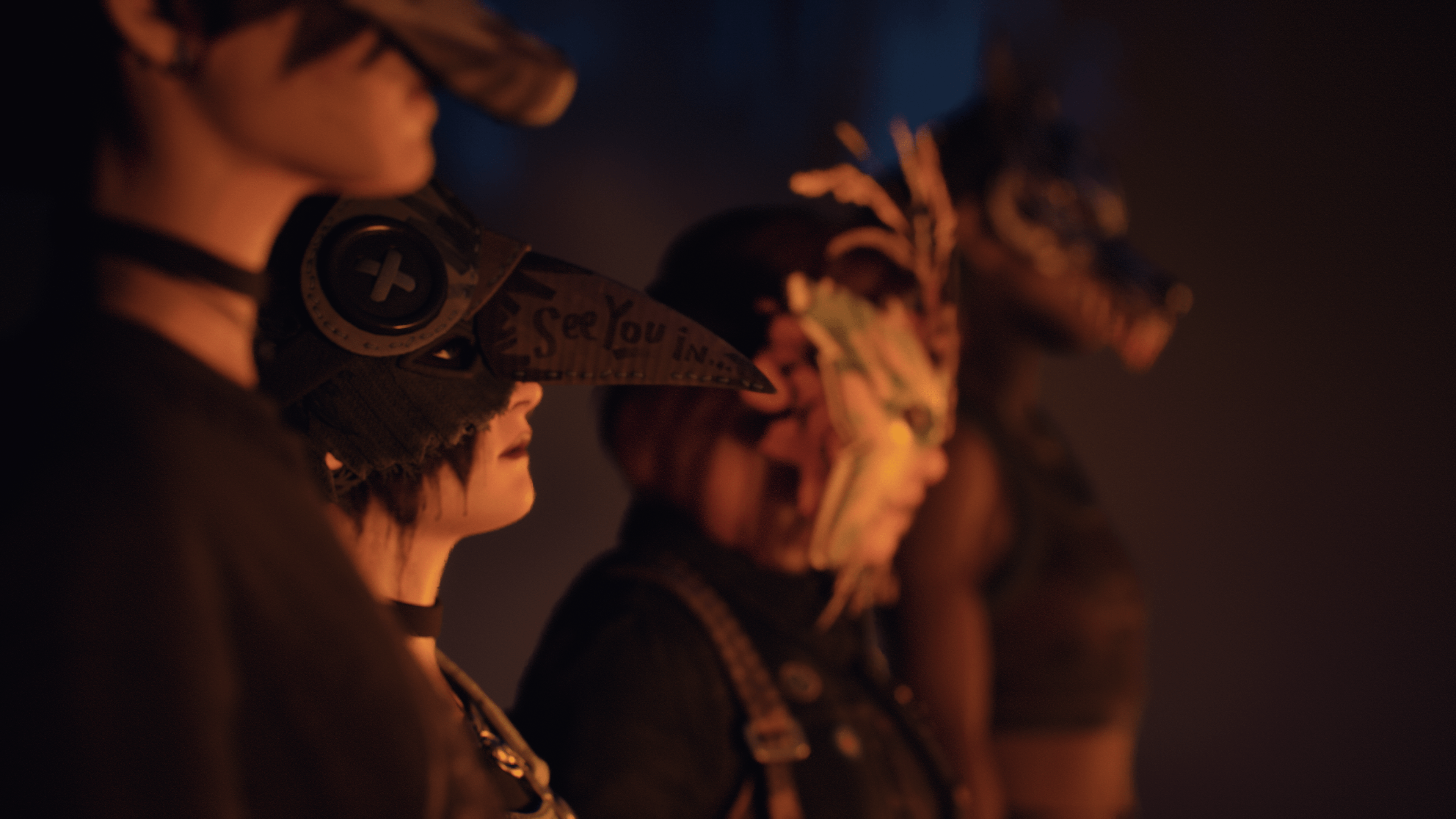 Teen girls wearing animal masks, standing next to each other