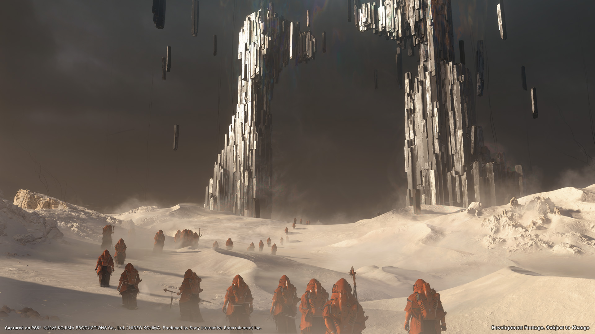 Red robed figures walk toward a giant mysterious gate in Death Stranding 2