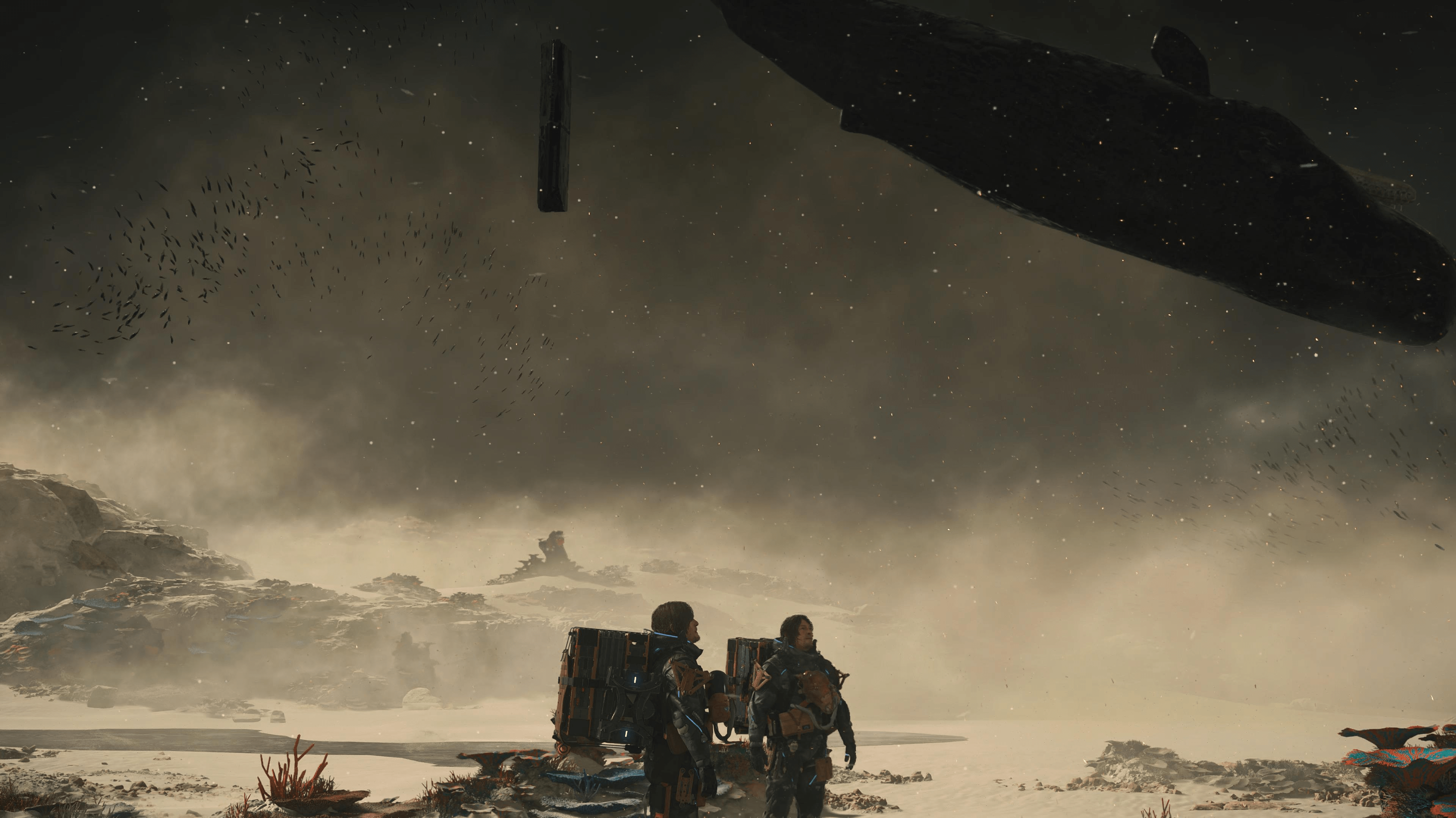 Sam Bridges in Death Stranding 2 looks up at the night sky.