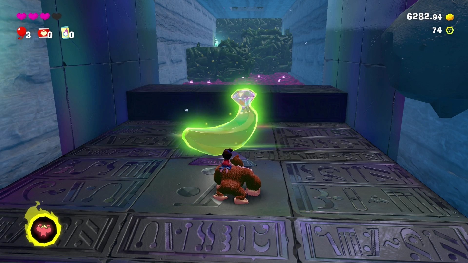 DK stands next to a Bandanium Gem in a cave in the Donkey Kong Bananza Lagoon Layer