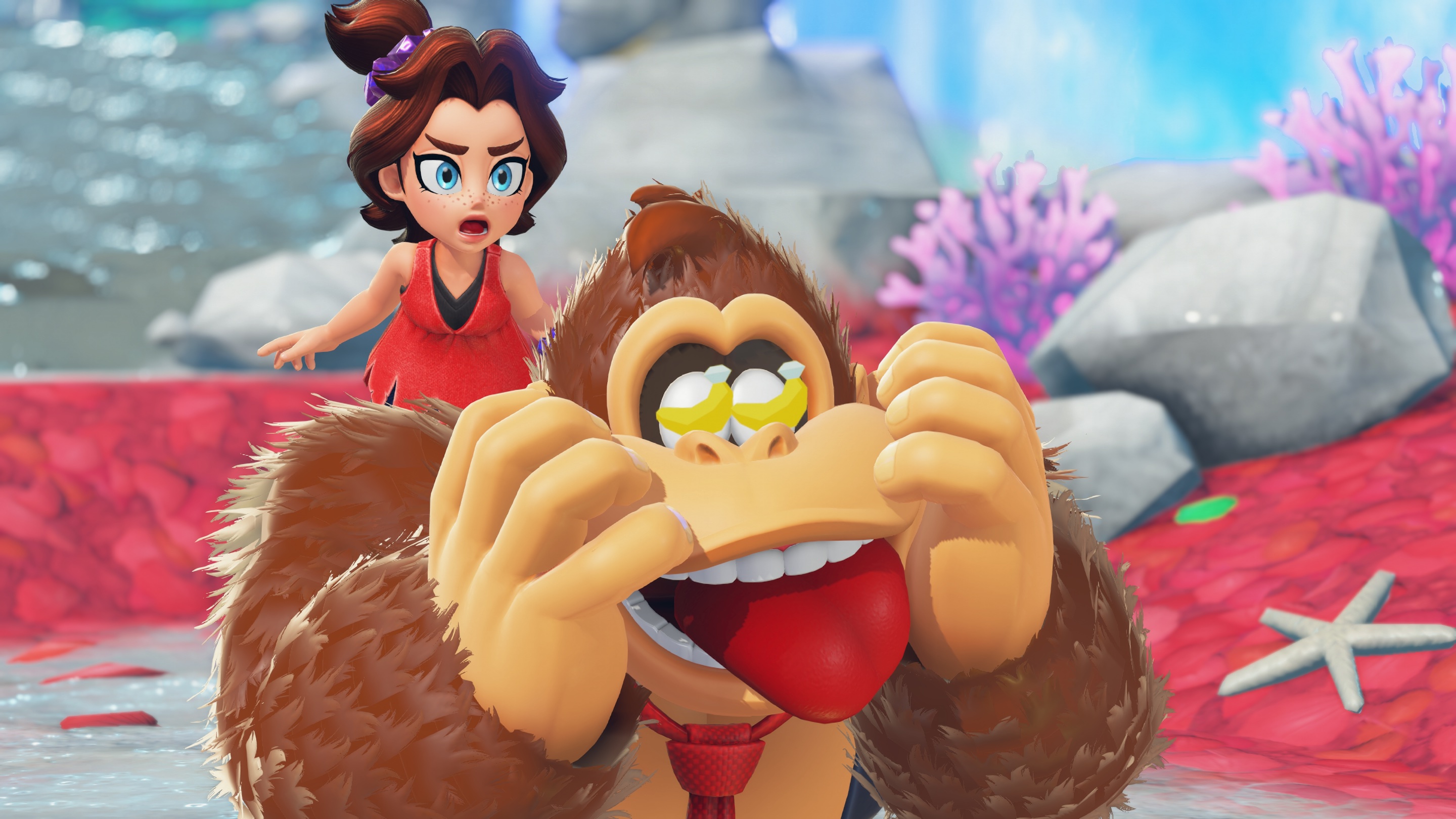 Pauline rides on Donkey Kong’s back as he lovingly gazes at Banandium Gems in a screenshot from Donkey Kong Bananza